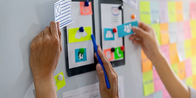 Creative Web Designer planning application and developing templa